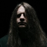 George “Corpsegrinder” Fisher issues video for “Bottom Dweller”